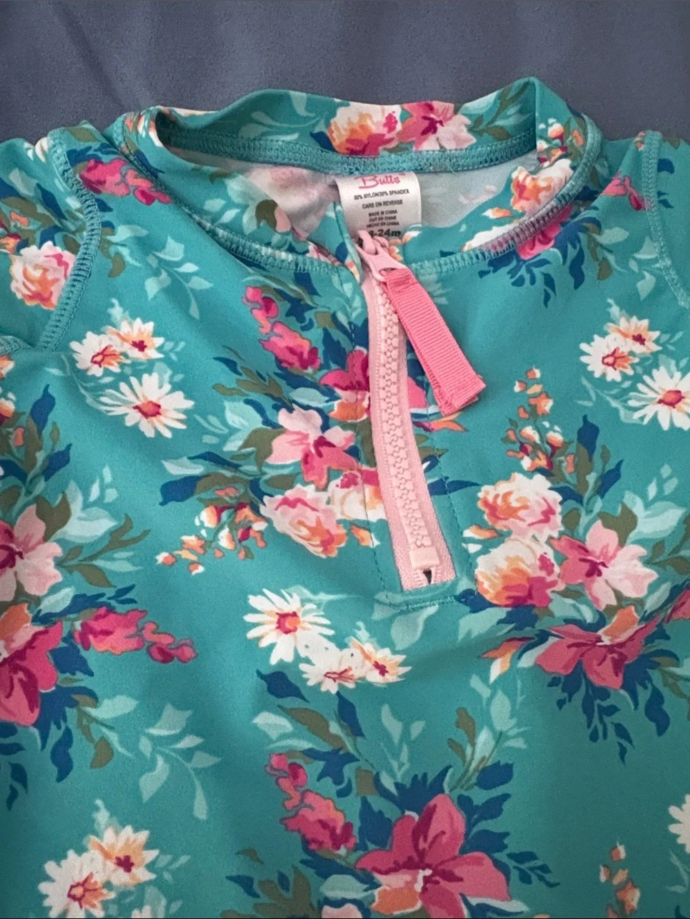 Ruffle Butts Teal Floral Rashguard with Pink-Striped Bottoms